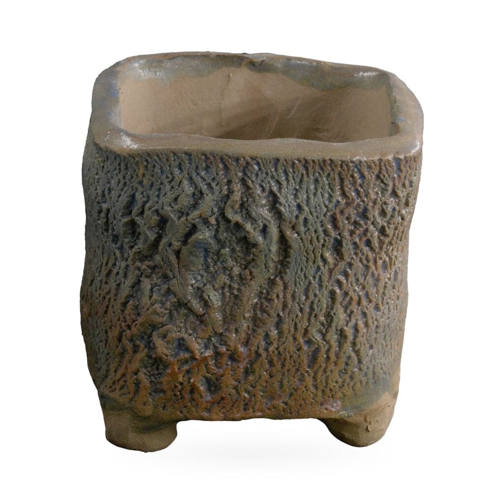 Square footed pot with deep bark-like texture in mottled grey-brown glaze with hints of blue and rust
