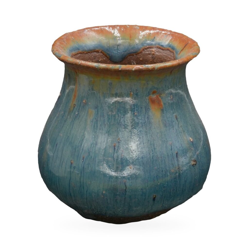 Bulb-shaped pot in streaky glossy teal-blue drip glaze with a rust-orange flared rim