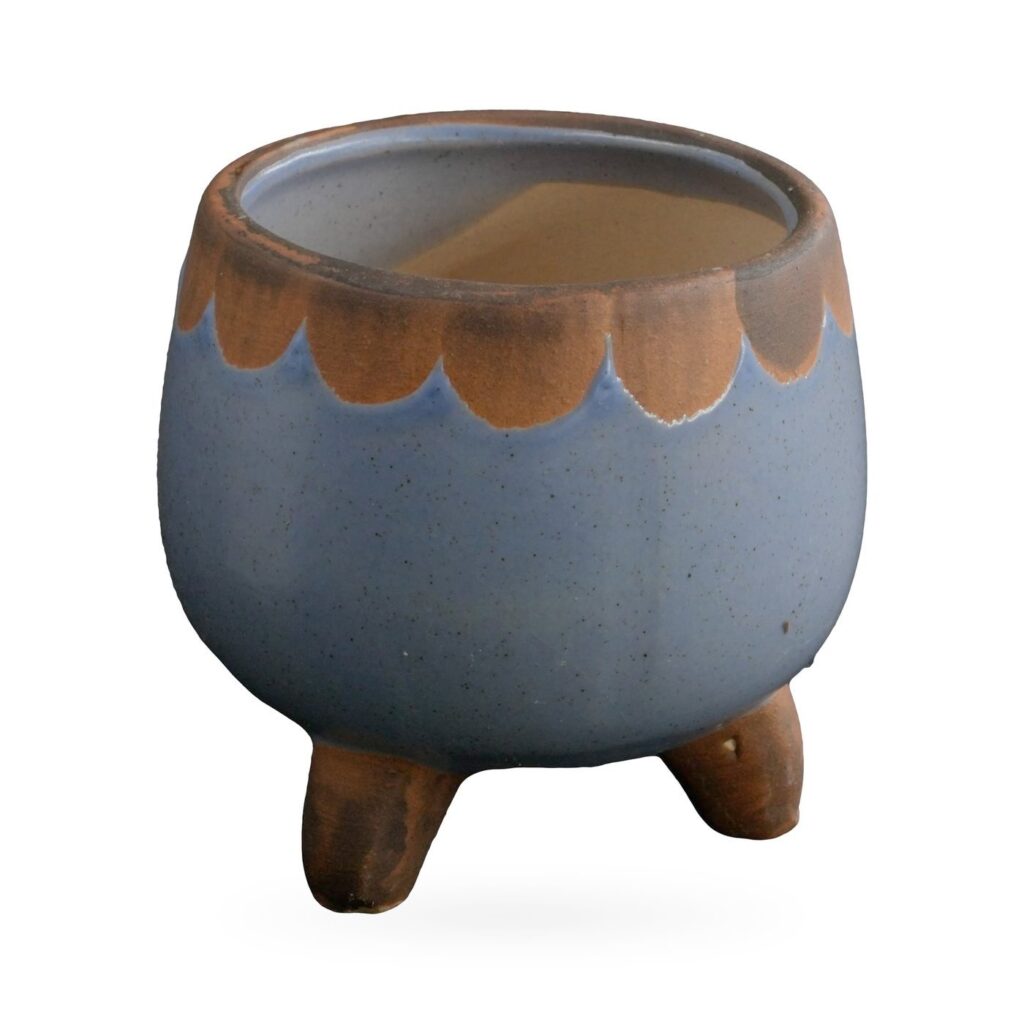 Small periwinkle-blue footed succulent pot with a rust-brown scalloped rim band