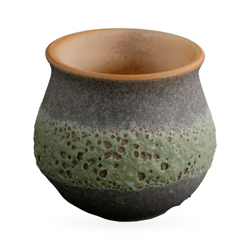 Small rounded pot with moss-green lava-style glaze, grey bands and a terracotta rim