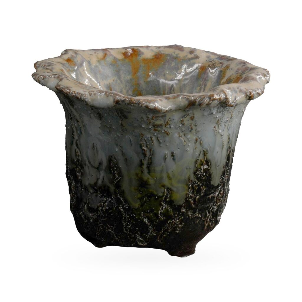 Ruffled-rim succulent pot in glossy lava-textured glaze, black at the base fading to blue-grey and rust