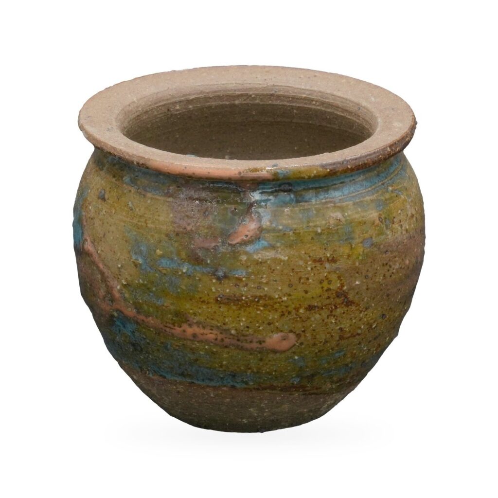 Rounded olive green succulent pot with turquoise and rust glaze streaks and a natural clay rim